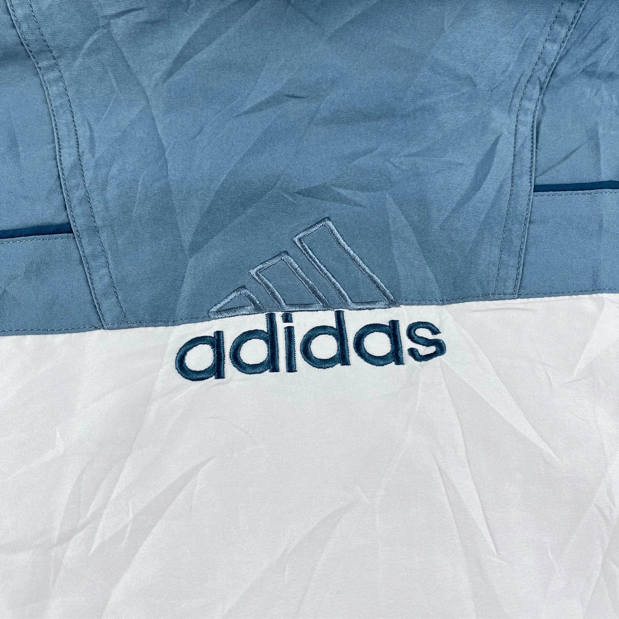 Adidas Trainingsjacke Vintage 2000er mit blau-weißer Farbgestaltung und gesticktem Adidas Logo