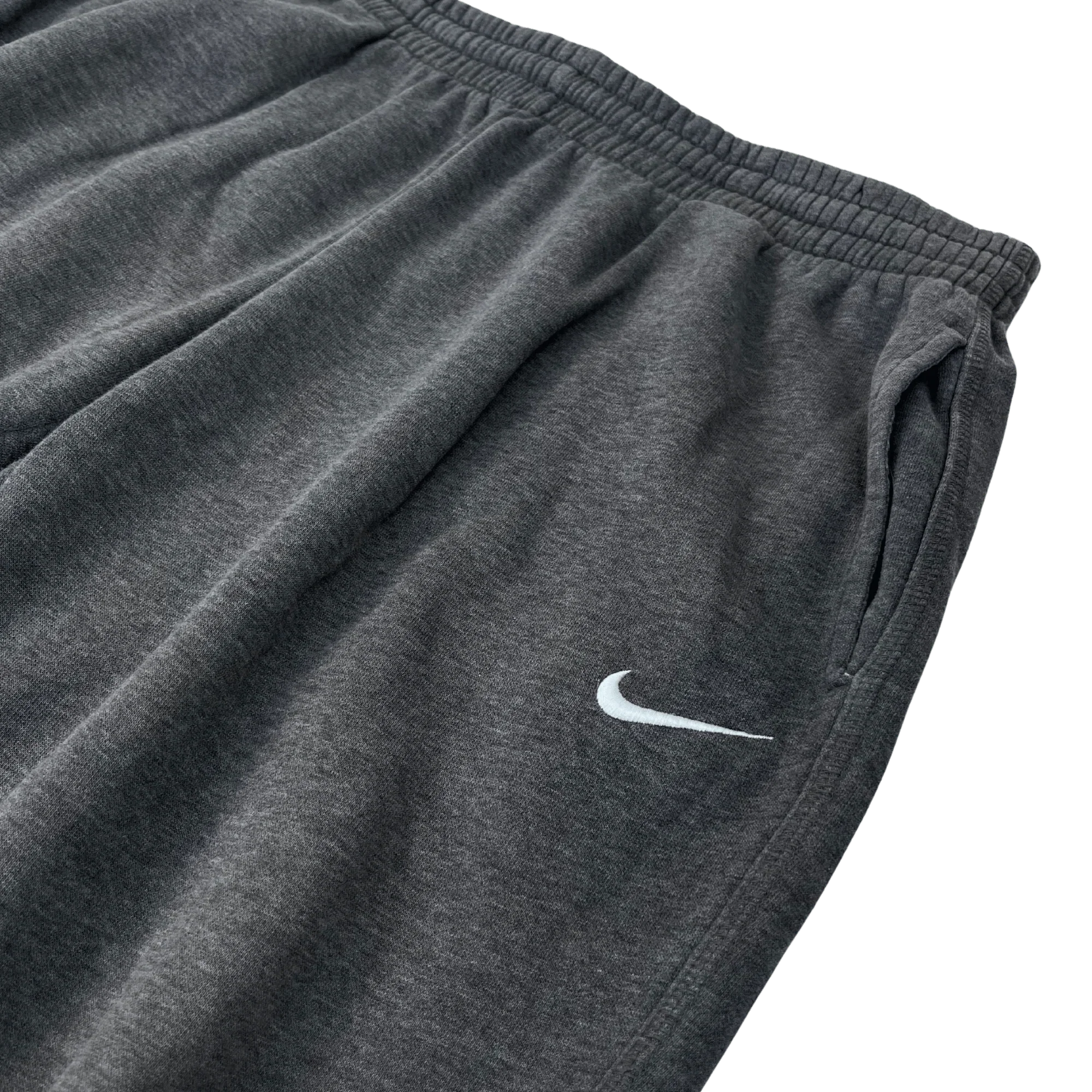 Nike Jogginghose Vintage in dunkelgrau mit elastischem Bund und weißem Nike Logo von Kickvault