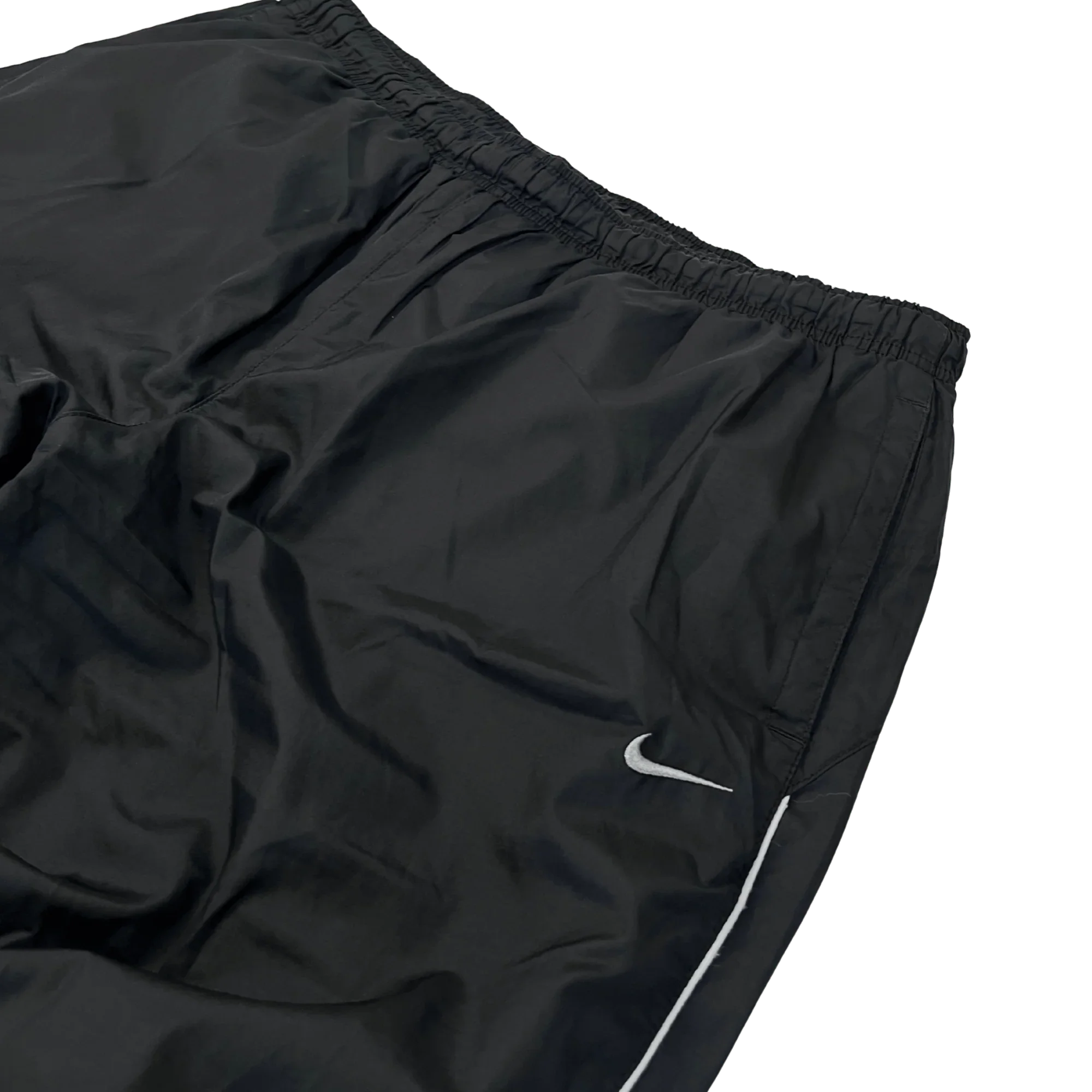 Nike Trackpants Herren limitiert in Schwarz mit elastischem Bund und weißem Nike Swoosh von Kickvault