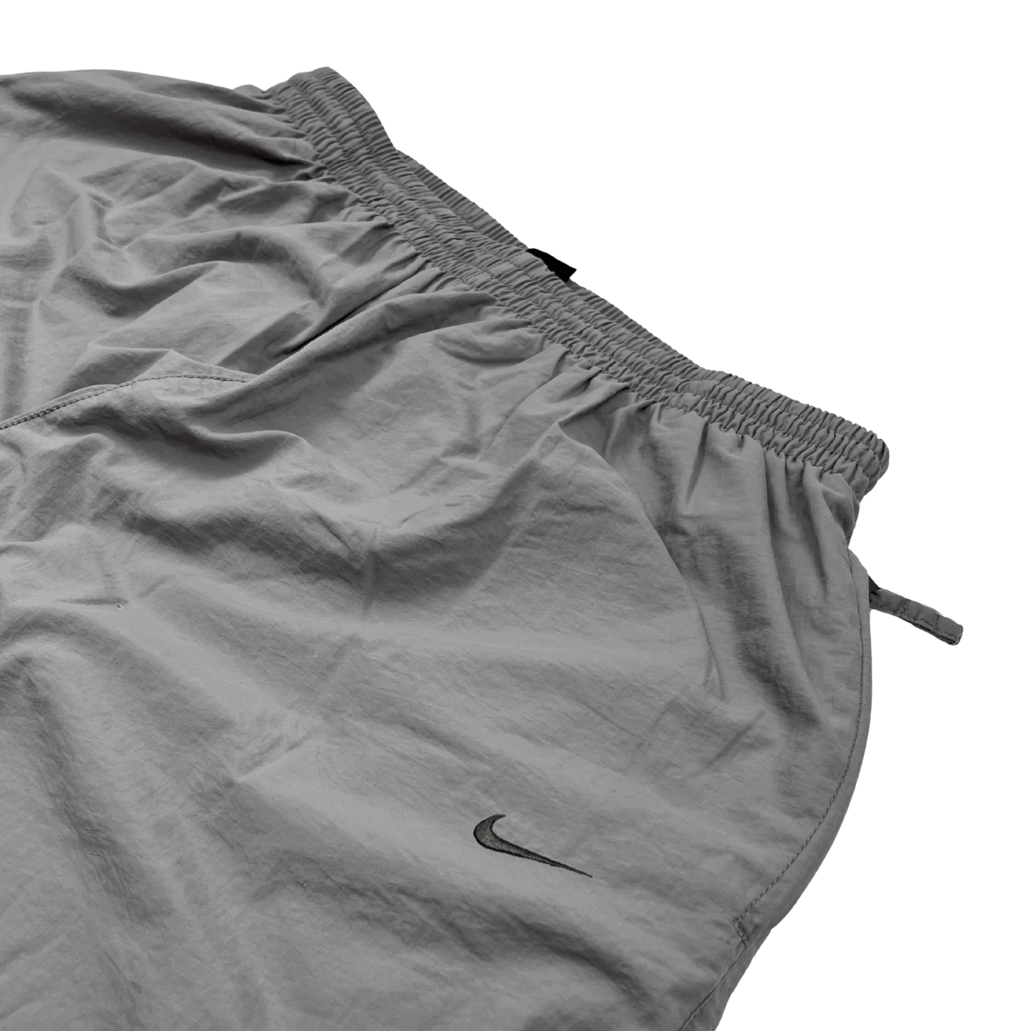 Kickvault Nike Trackpants Vintage in Grau mit elastischem Bund und Nike Logo auf der Vorderseite