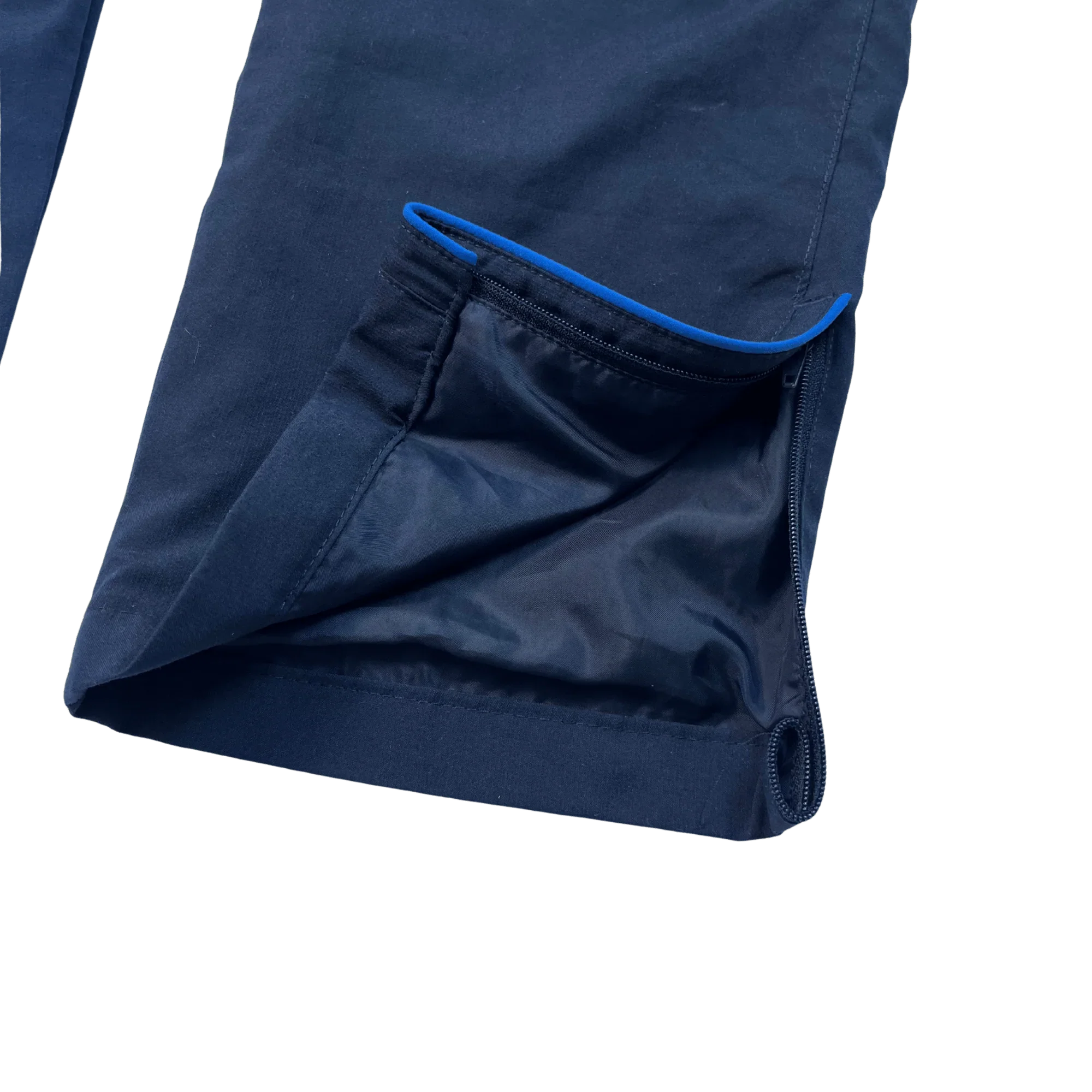 Detailansicht der dunkelblauen Nike Trackpants Vintage mit gedecktem Zipper am Beinabschluss