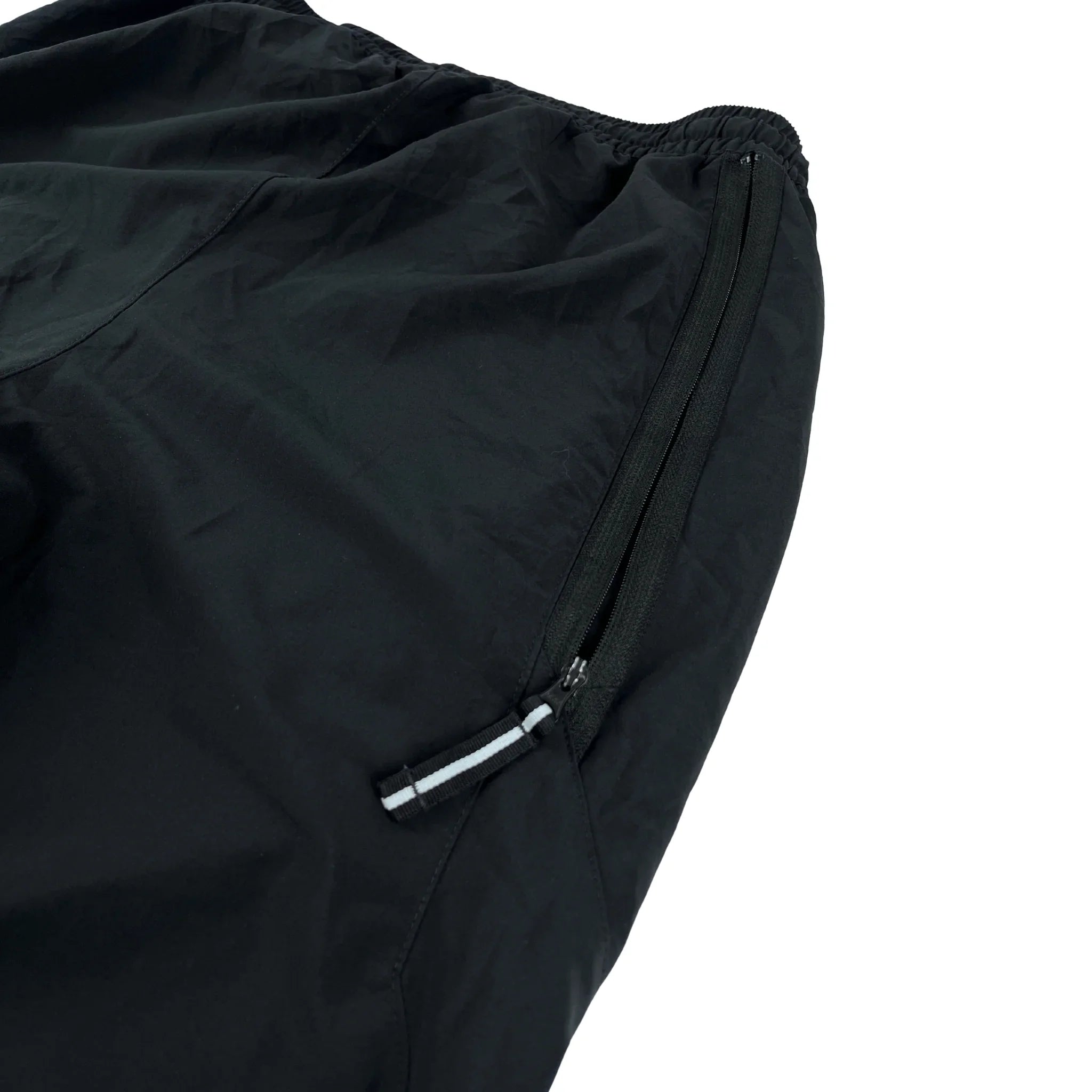Nike Trackpants Vintage schwarz mit Reißverschlusstasche und elastischem Bund aus leichtem Material