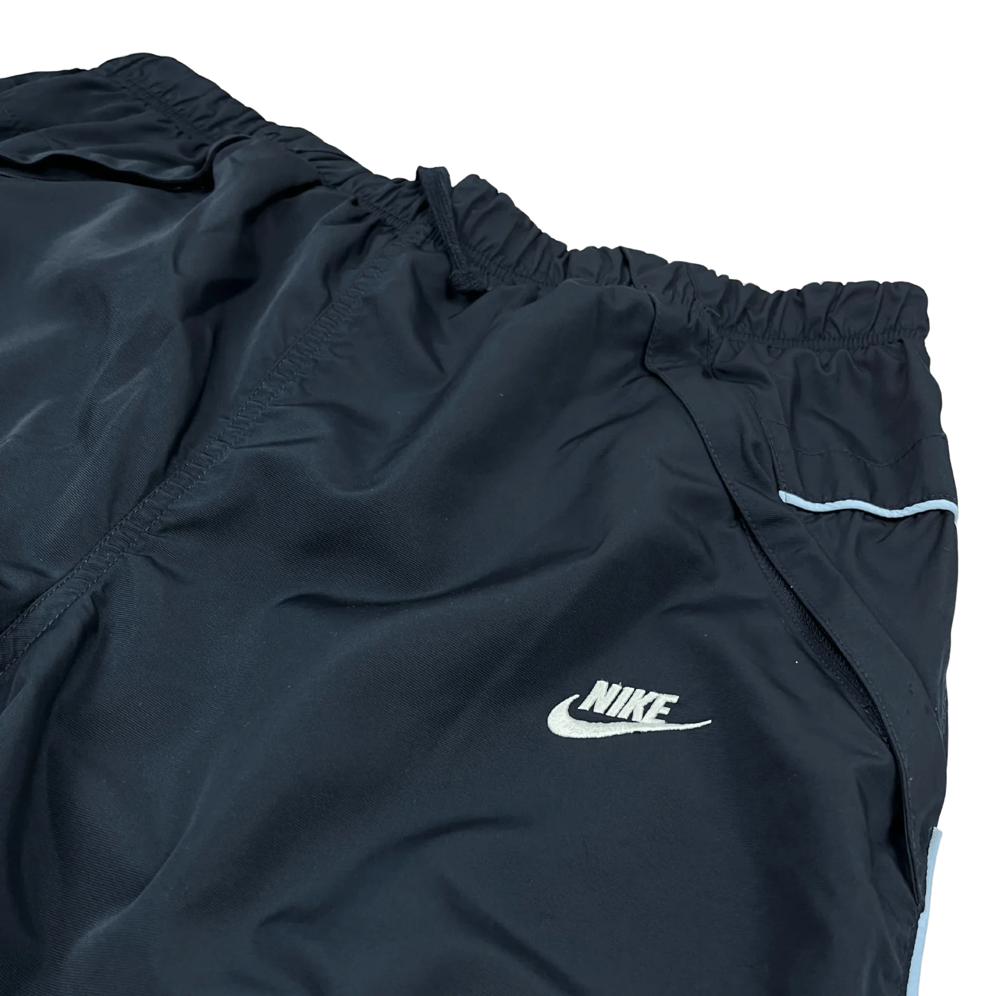 Kickvault Vintage Streetwear nike trackpants blau mit elastischem Bund und weißem Nike-Logo