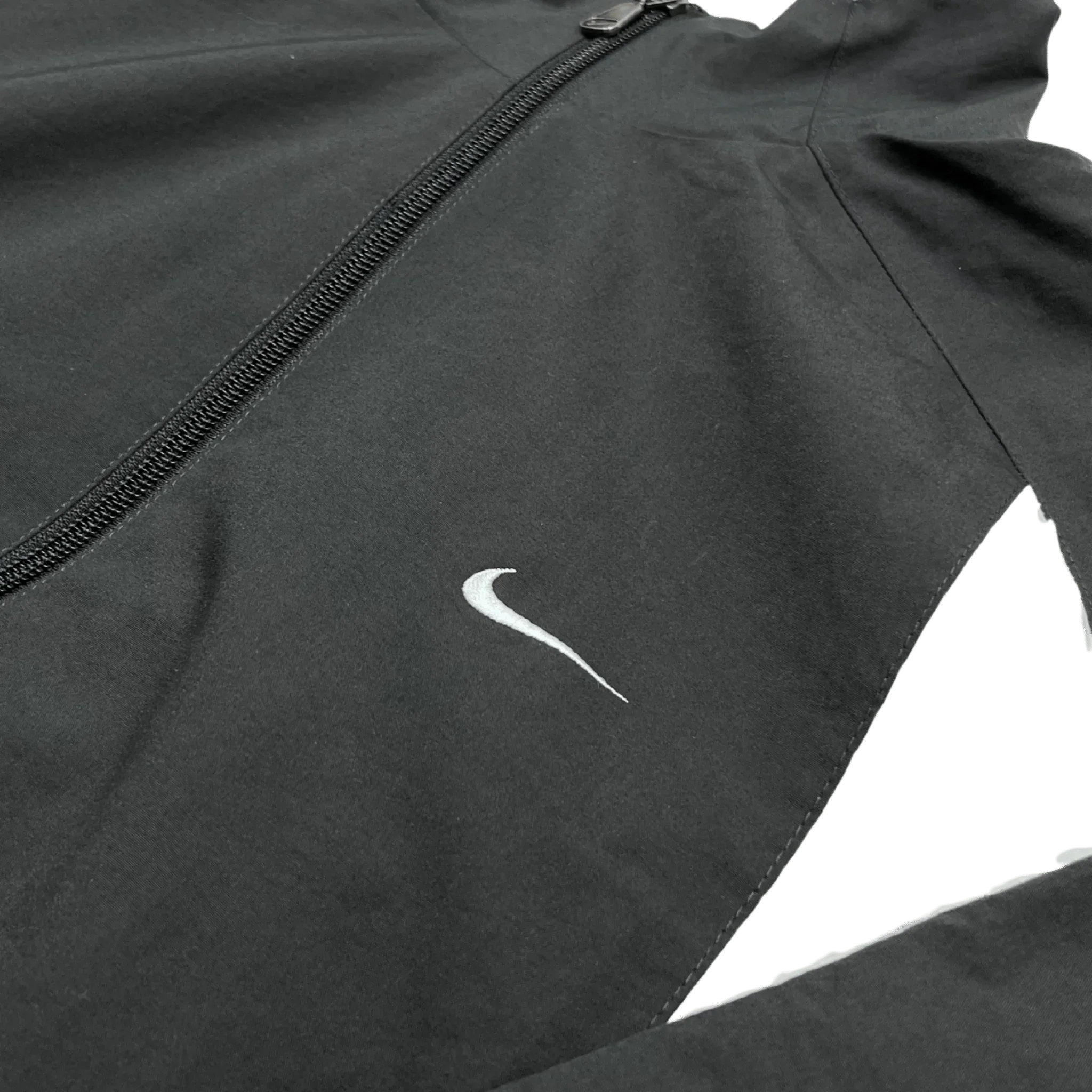 Nike Vintage Trainingsjacke grau weiß blau mit Reißverschluss und weißem Nike-Logo von Kickvault