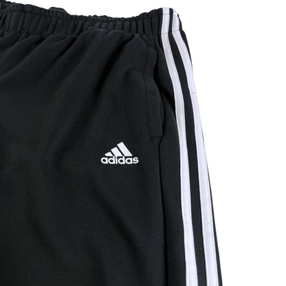 Adidas Jogginghose Vintage baggy weisse steifen mit elastischem Bund und Seitentaschen in Schwarz