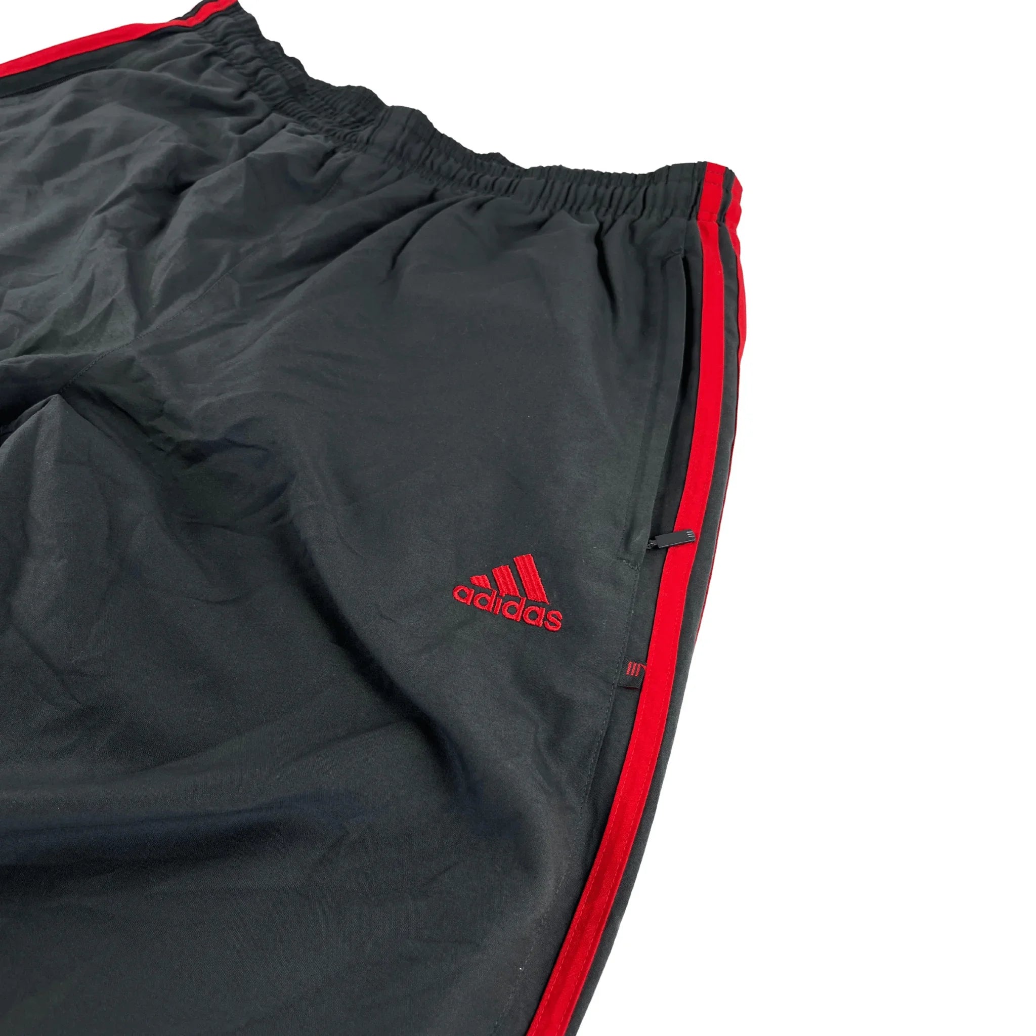 Schwarze adidas trackpants Rot Classic Fit Trainingshose mit roten Streifen und Logo