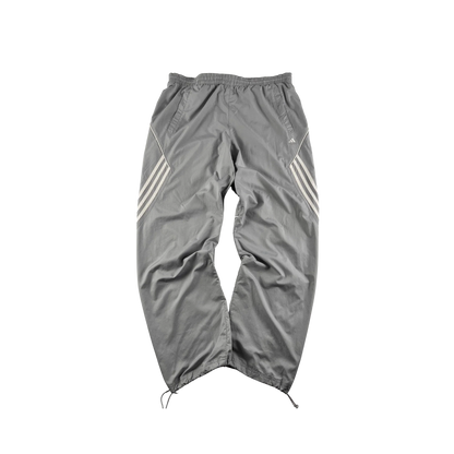 Graue adidas Trackpants Vintage mit elastischem Bund und Streifen an den Seiten