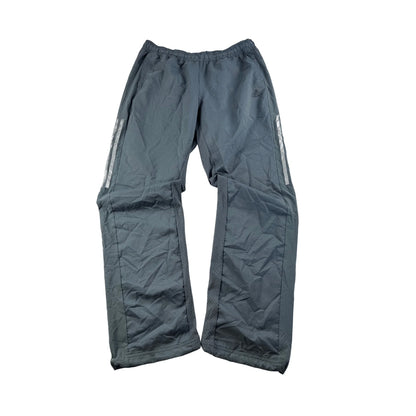 Adidas Trackpants Vintage Schwarz von Kickvault mit seitlichen Streifen und elastischem Bund