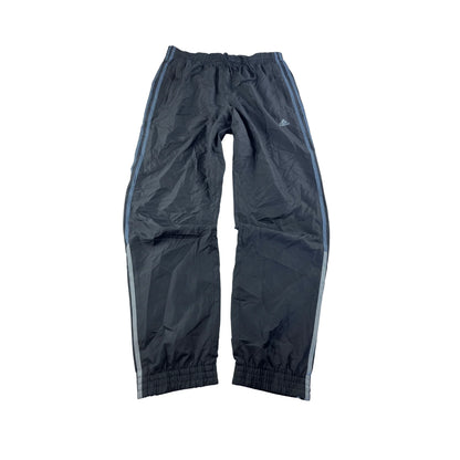 Kickvault Adidas Trackpants Vintage streifen in schwarz mit elastischem Bund und seitlichen Streifen