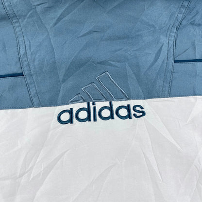 Adidas Trainingsjacke Vintage 2000er mit blau-weißer Farbgestaltung und gesticktem Adidas Logo