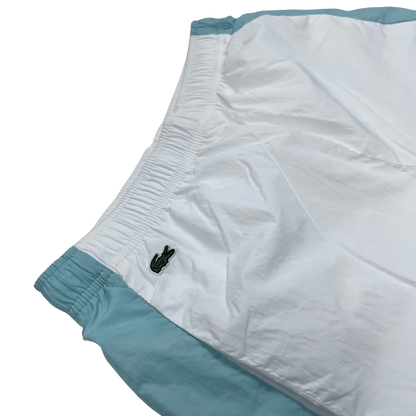 Weiße Lacoste Trackpants Vintage weiß mit elastischem Bund und grünem Krokodil-Logo von Kickvault