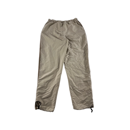Baggy Nike Trackpants Vintage Sandfarben von Kickvault mit elastischem Bund und lockerem Schnitt