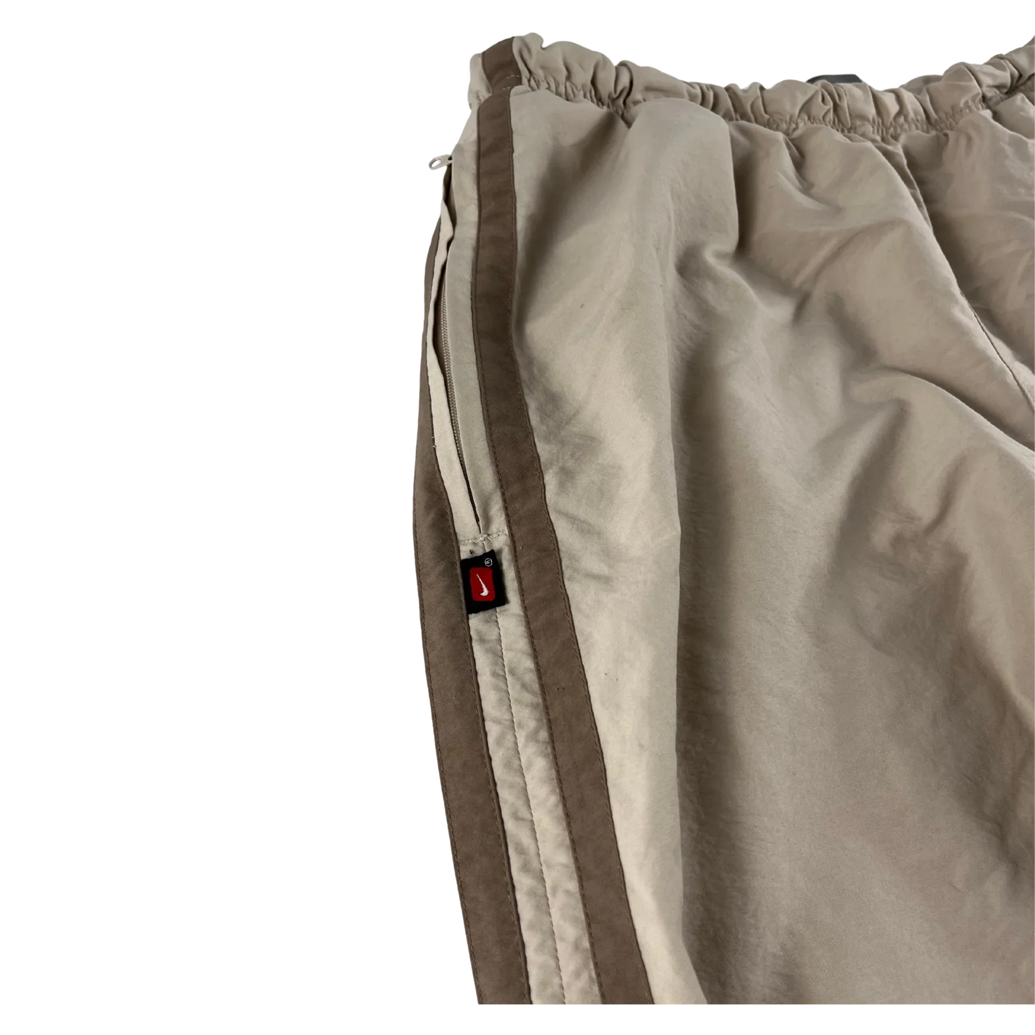 Baggy Nike Trackpants Vintage Sandfarben von Kickvault mit elastischem Bund und braunen Seitenstreifen