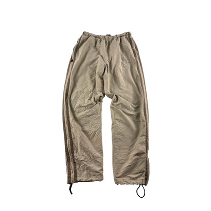 Baggy Nike Trackpants Vintage Sandfarben von Kickvault mit elastischem Bund und seitlichen Streifen