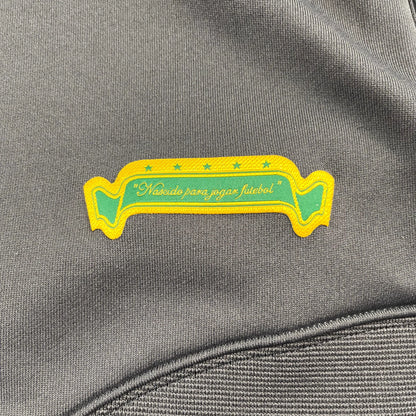 Nike Brasilien Trainingsjacke Vintage Official Teamwear mit gelb-grünem Emblem auf grauem Stoff