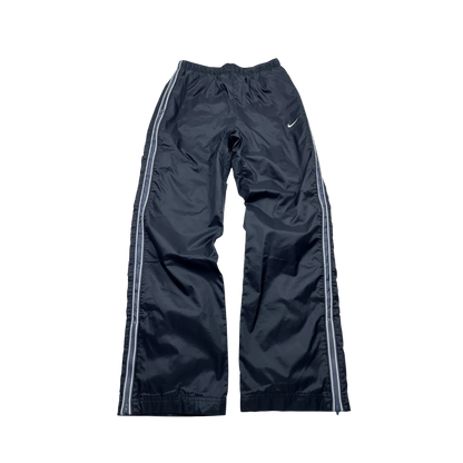 Nike trackpants baggy in dunkelblau von Kickvault mit weißen Streifen und elastischem Bund