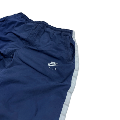 Nike Trackpants Blau Vintage von Kickvault mit elastischem Bund und seitlichen weißen Streifen