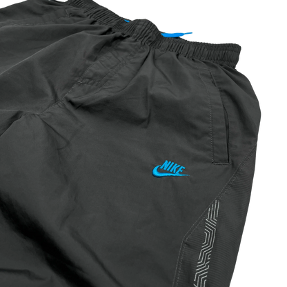 Nike Trackpants Vintage hellblauer swoosh auf schwarzer Jogginghose mit elastischem Bund