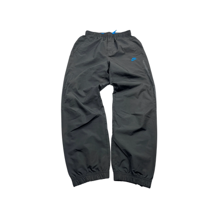 Nike Trackpants Vintage hellblauer swoosh schwarze Jogginghose mit elastischem Bund und Bündchen