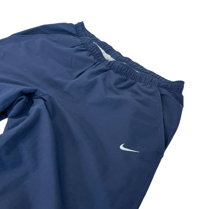 Nike Trackpants Vintage kaufen baggy dunkelblaue Jogginghose mit elastischem Bund von Kickvault
