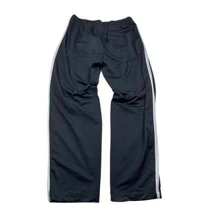Nike Trackpants Vintage in Schwarz mit weißen Seitenstreifen von Kickvault