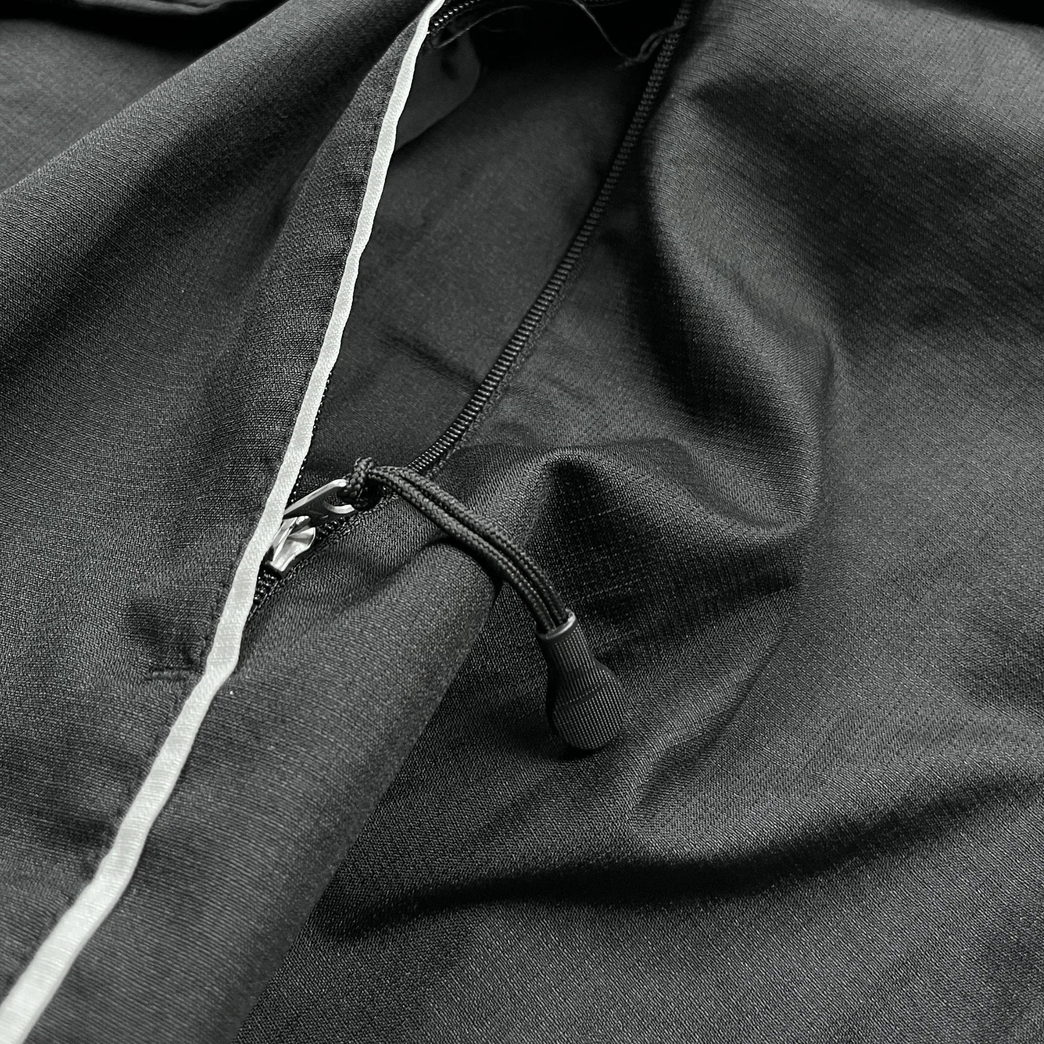 Nike Trainingsjacke Vintage in Schwarz mit Reißverschluss und Kordelzug von Kickvault