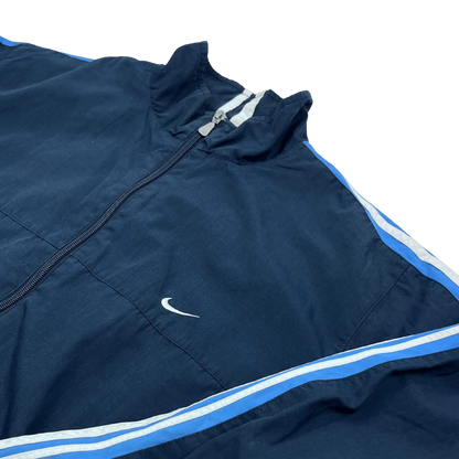 Nike Trainingsjacke Vintage in Dunkelblau mit weiß-blauen Streifen und kleinem Nike Swoosh Logo