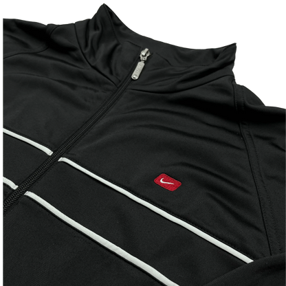 Nike Trainingsjacke Vintage Schwarz mit Reißverschluss und weißem Streifendesign von Kickvault