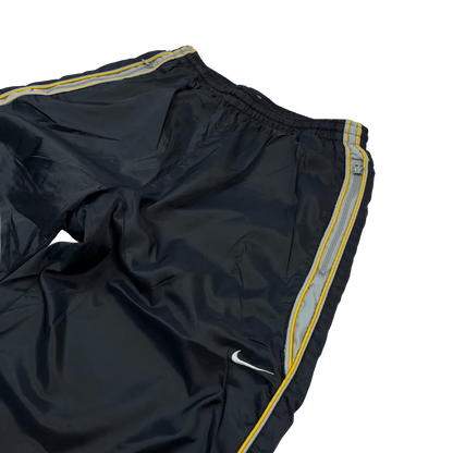 Nike vintage jogginghose gold streifen baggy fit open leg schwarze Trackpants mit gelben Streifen