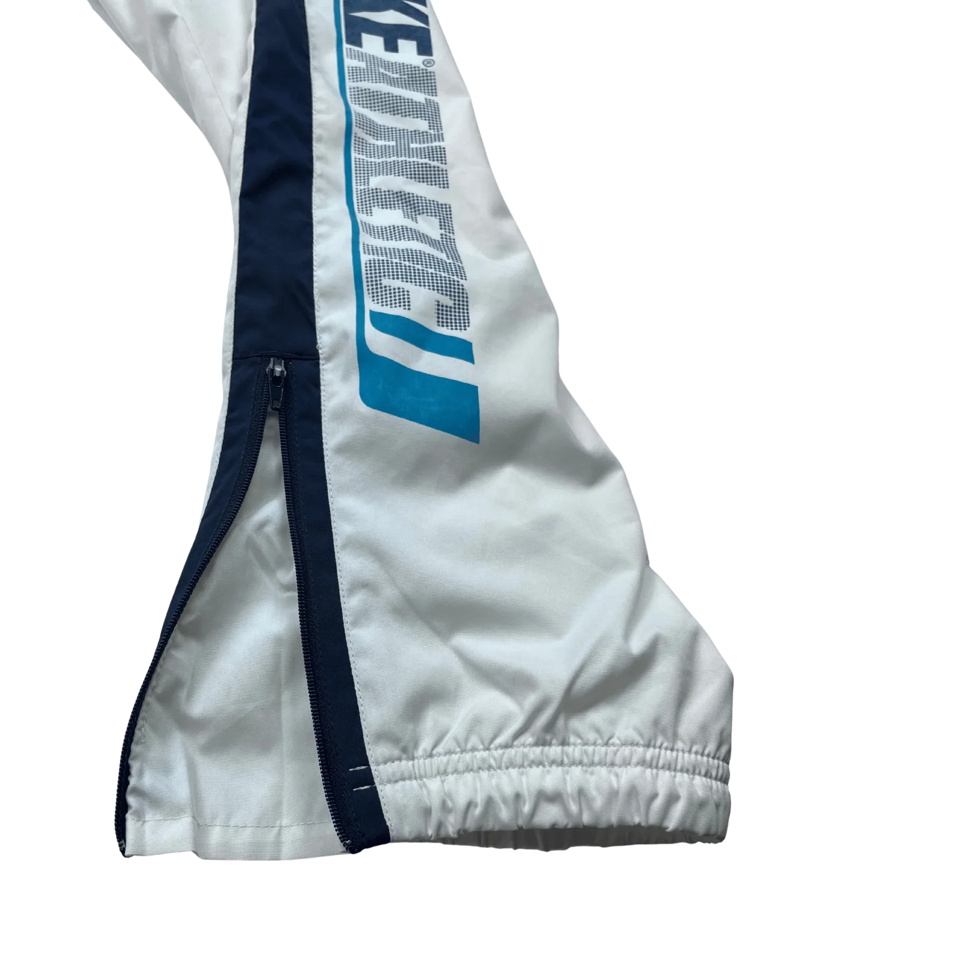 Vintage Nike Trackpants weiß von Kickvault mit seitlichem Reißverschluss und elastischem Bund