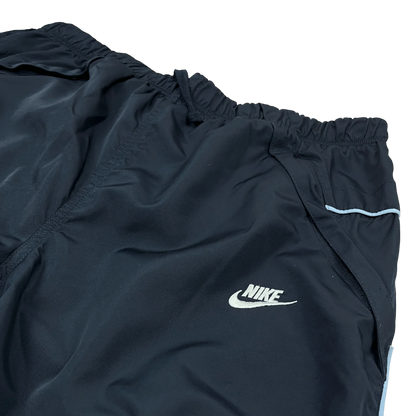 Kickvault Vintage Streetwear nike trackpants blau mit elastischem Bund und weißem Nike-Logo