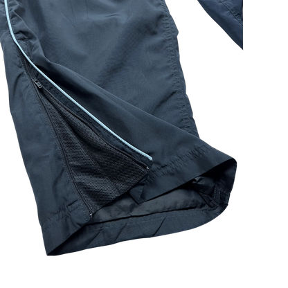 Kickvault Vintage Streetwear nike trackpants blau mit Reißverschluss und Mesh-Innenfutter am Beinabschluss