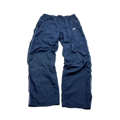 Kickvault Vintage Streetwear nike trackpants blau mit elastischem Bund und seitlichen Streifen
