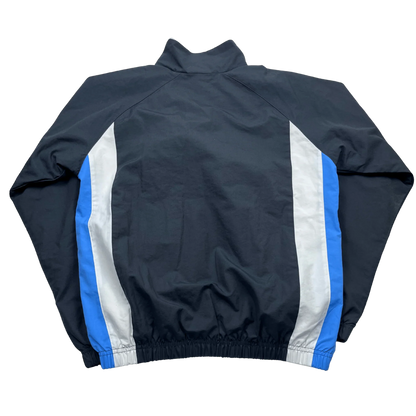 Nike Vintage Trainingsjacke grau weiß blau von Kickvault mit Retro-Stil und farbigen Seitenstreifen